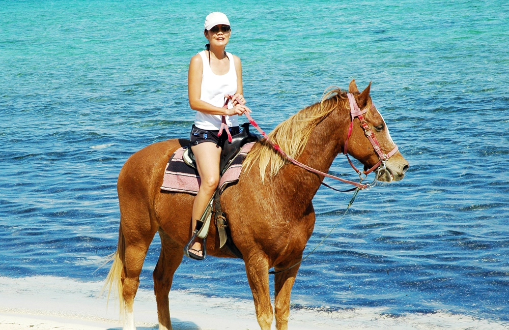 Beach trek shoreline Grand Cayman